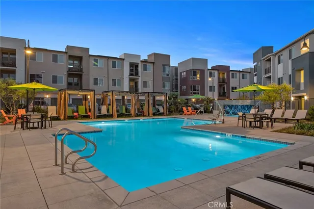 a view of a street with a palm tree