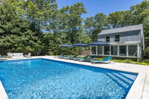swimming pool view with a outdoor space