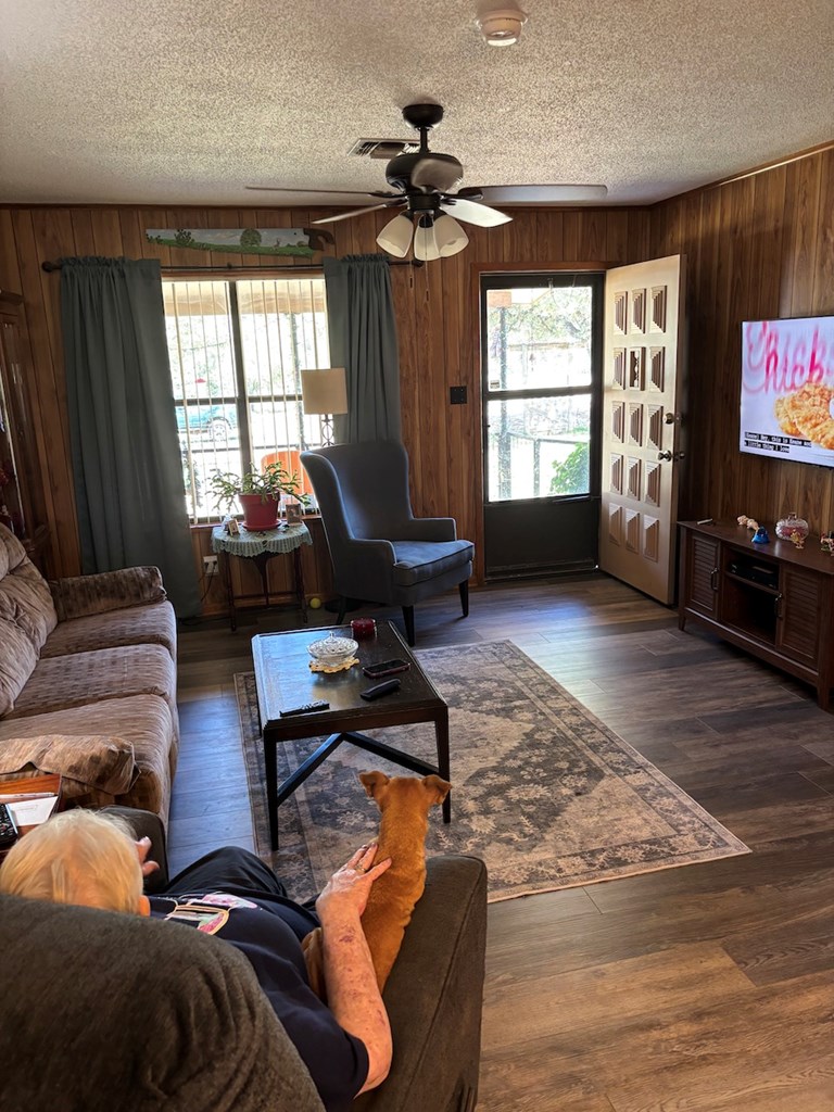 727 Cemetery Road Stonewall, TX 78671 - Photo 5 of 16 a living room with furniture and a flat screen tv