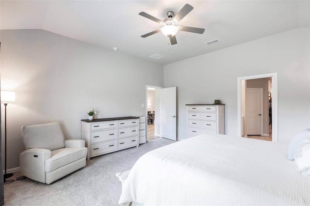 1504 Cobblestone Road Melissa, TX 75454 - Photo 19 of 39 Light-filled owner’s suite with room for a sitting area.