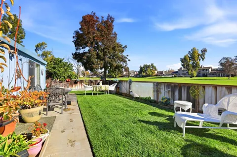 a view of a lake with a garden