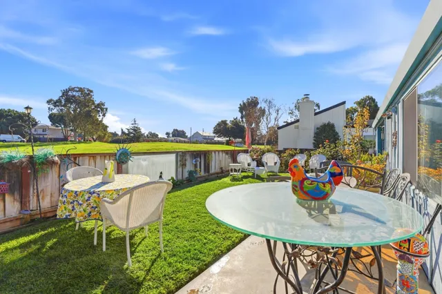 a view of a chairs and table in the terrace