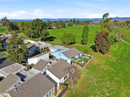 an aerial view of a house with garden
