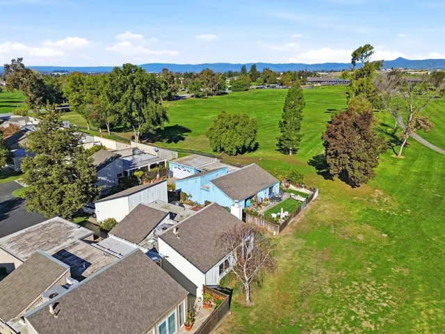 an aerial view of a house with garden