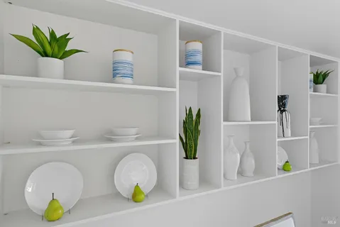 a bathroom with a sink a mirror and vanity