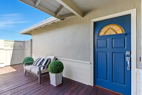 a view of a livingroom with furniture and deck