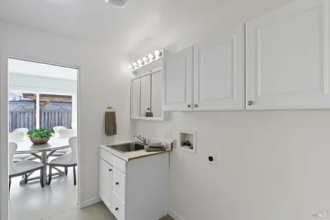 a view of outdoor dining space with a patio