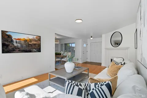 a view of a living room and dining room