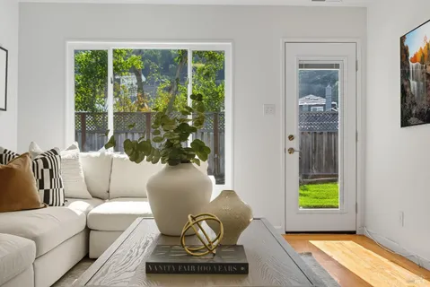 a living room with furniture and a window