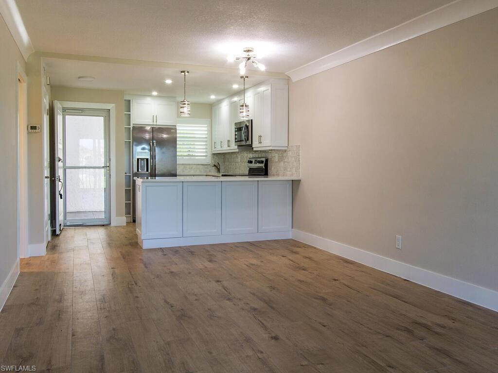 29 High Point Circle East, Unit 307 Naples, FL 34103 - Photo 2 of 14