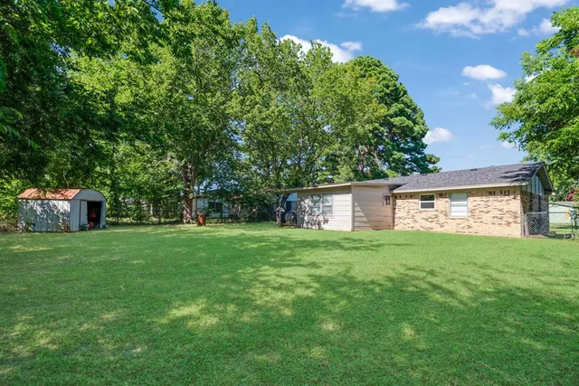 a house view with a garden space