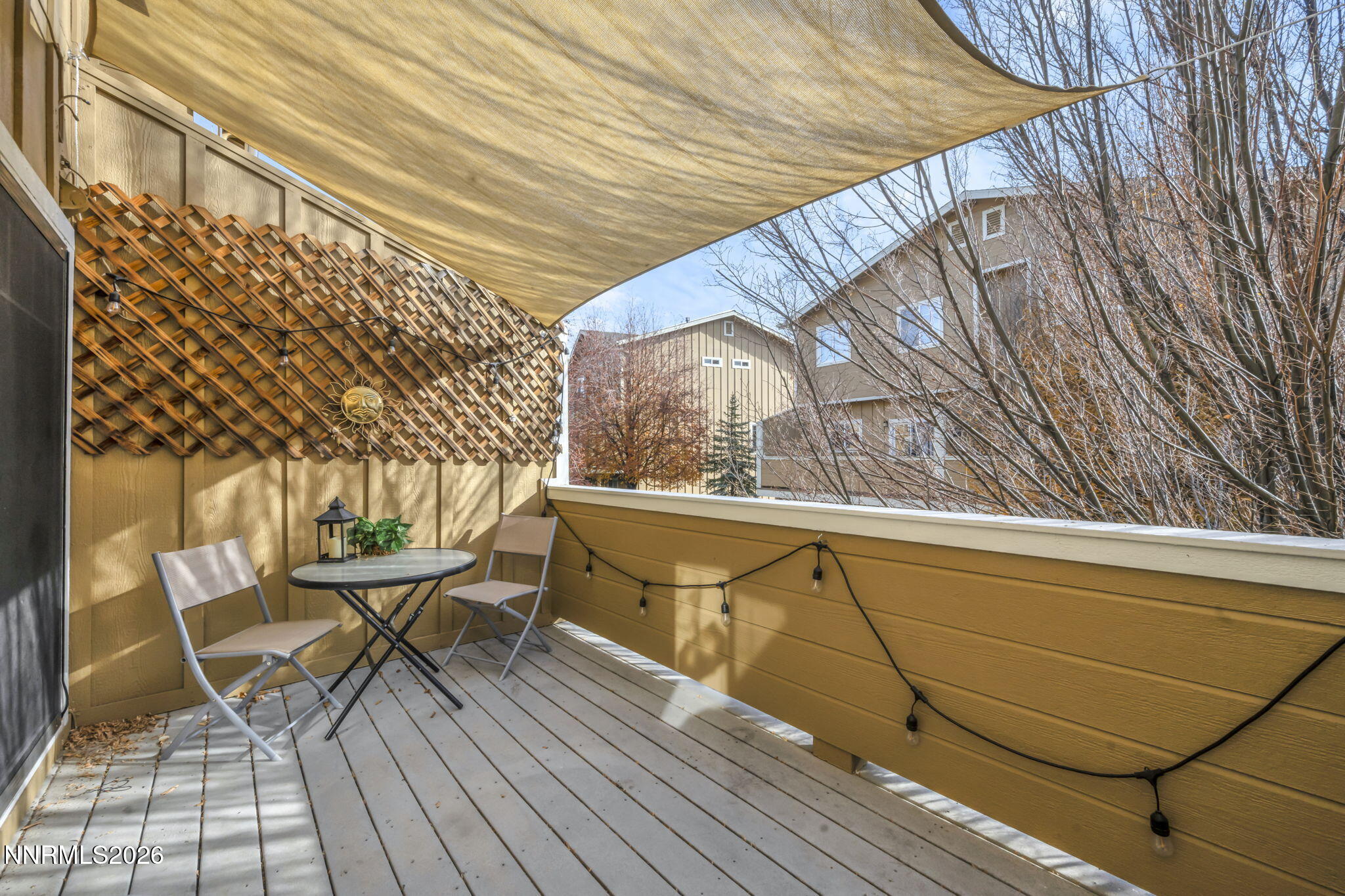 4592 Kathleen Denise Lane Reno, NV 89503 - Photo 20 of 22 a balcony with chairs and wooden floor