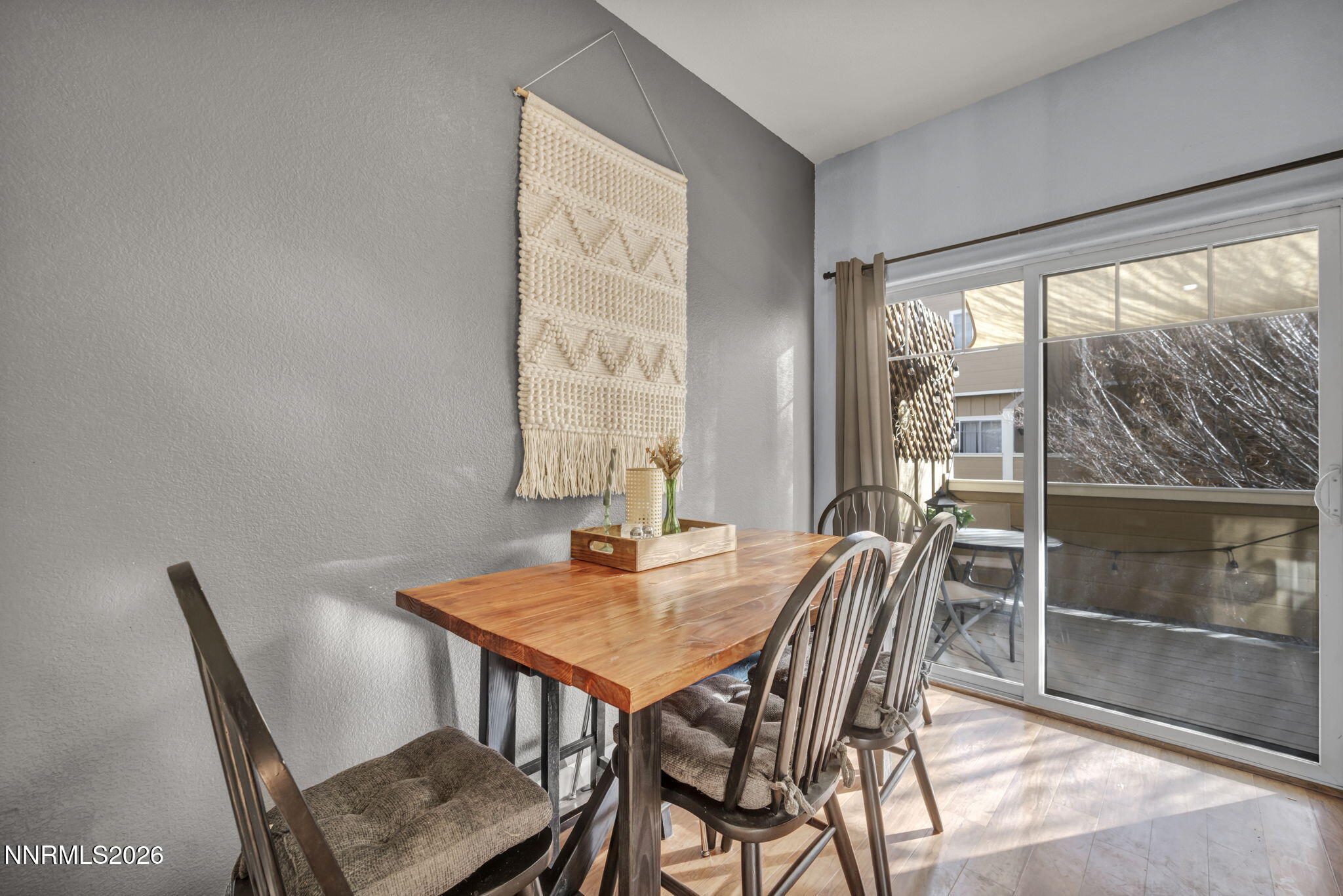 4592 Kathleen Denise Lane Reno, NV 89503 - Photo 4 of 22 a view of a dining room with furniture and wooden floor