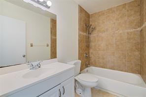 1700 Northwest 4th Avenue Boca Raton, FL 33432 - Photo 14 of 14 a bathroom with a sink a toilet and shower