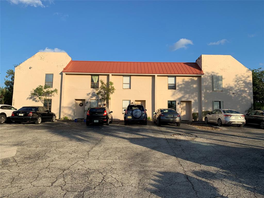 1700 Northwest 4th Avenue Boca Raton, FL 33432 - Photo 6 of 14 a view of car parked on the side of a road