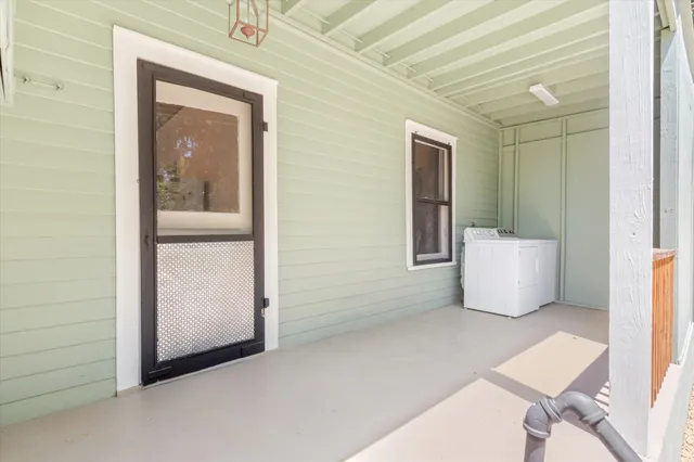 a view of an empty room and window