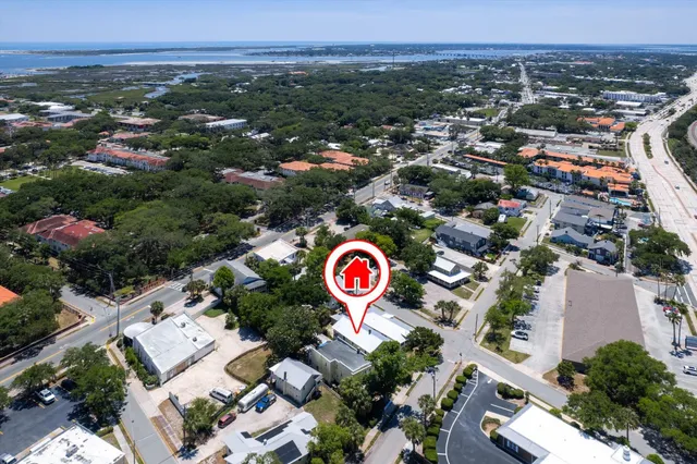 an aerial view of residential house with outdoor space