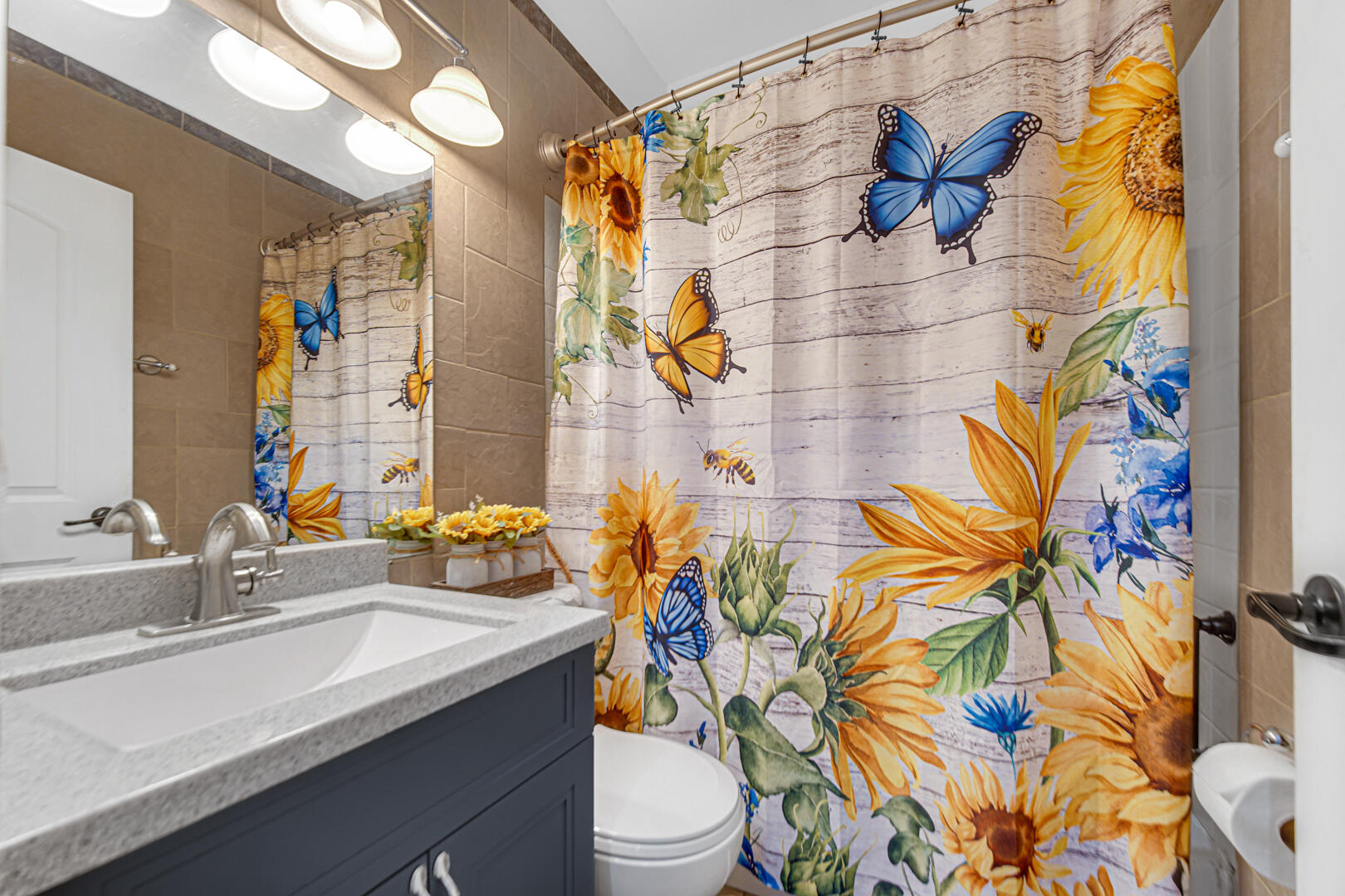 10 North Michigan Street La Crosse, IN 46348 - Photo 15 of 21 a bathroom with a sink toilet and shower