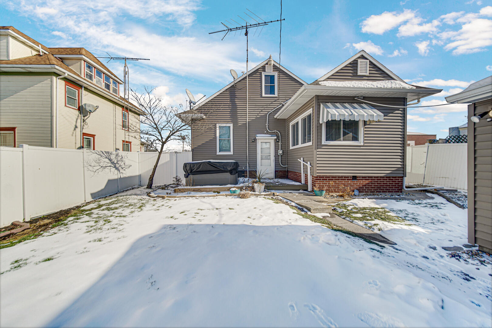 10 North Michigan Street La Crosse, IN 46348 - Photo 20 of 21 a front view of a house with a yard