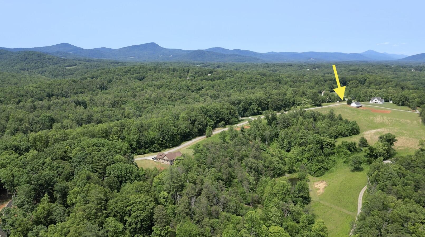 Lot 4 River Rock Road Vinton, VA 24179 - Photo 6 of 7 a view of a lush green forest with a house