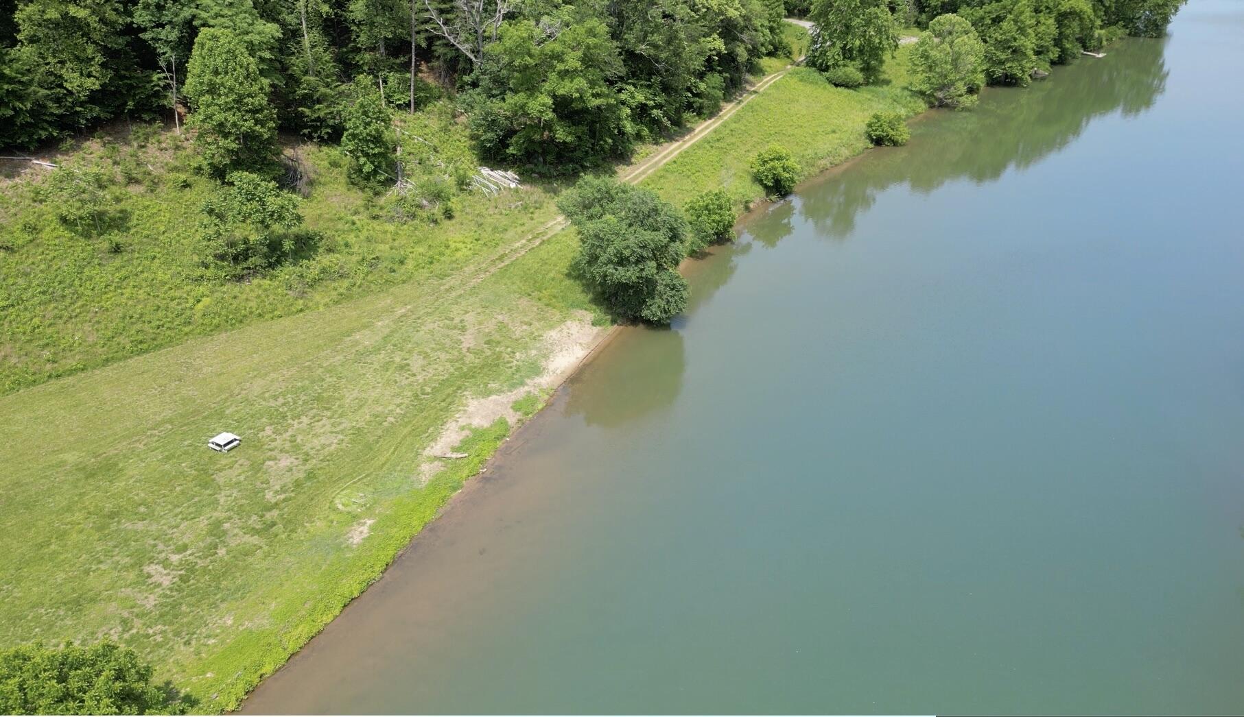 Lot 4 River Rock Road Vinton, VA 24179 - Photo 7 of 7 a view of a lake with a yard