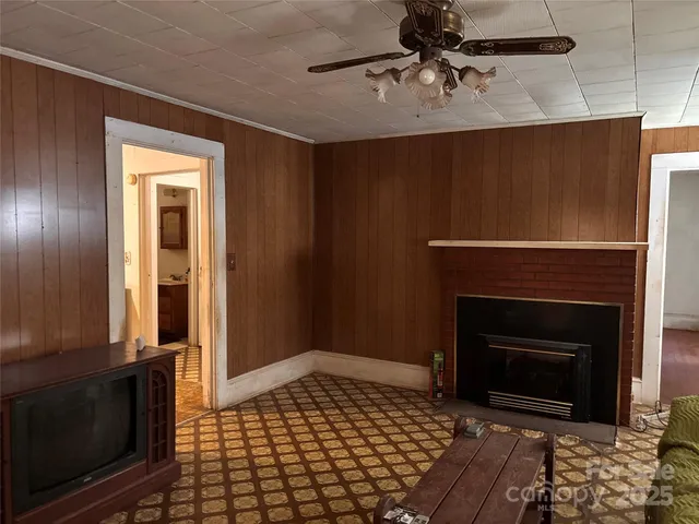 a living room with a fireplace