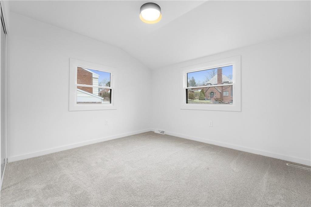 566 Kelso Road Pittsburgh, PA 15243 - Photo 34 of 40 an empty room with a painting and a window