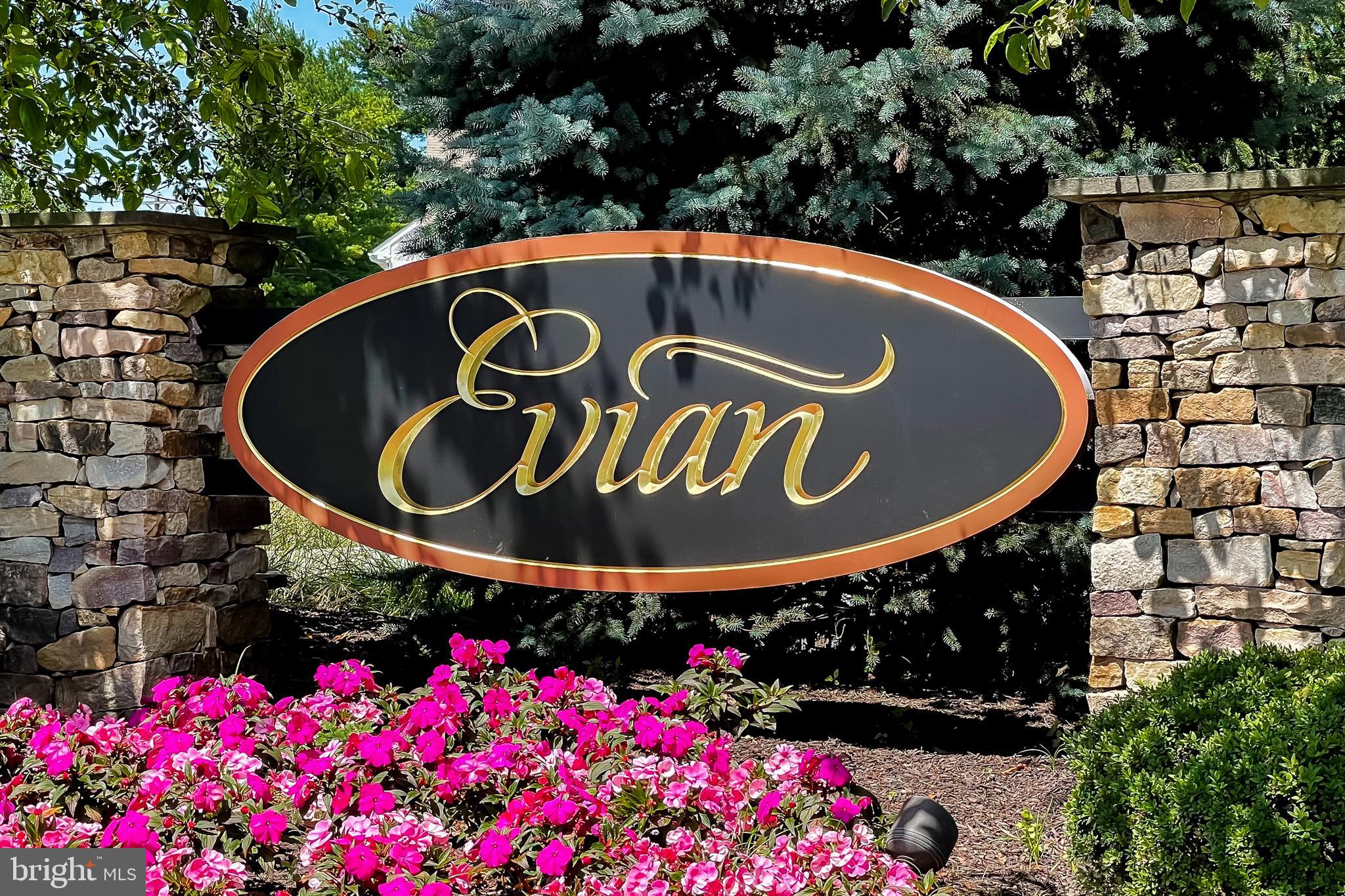 521 Pewter Drive Exton, PA 19341 - Photo 2 of 52 a sign that is sitting in front of flowers