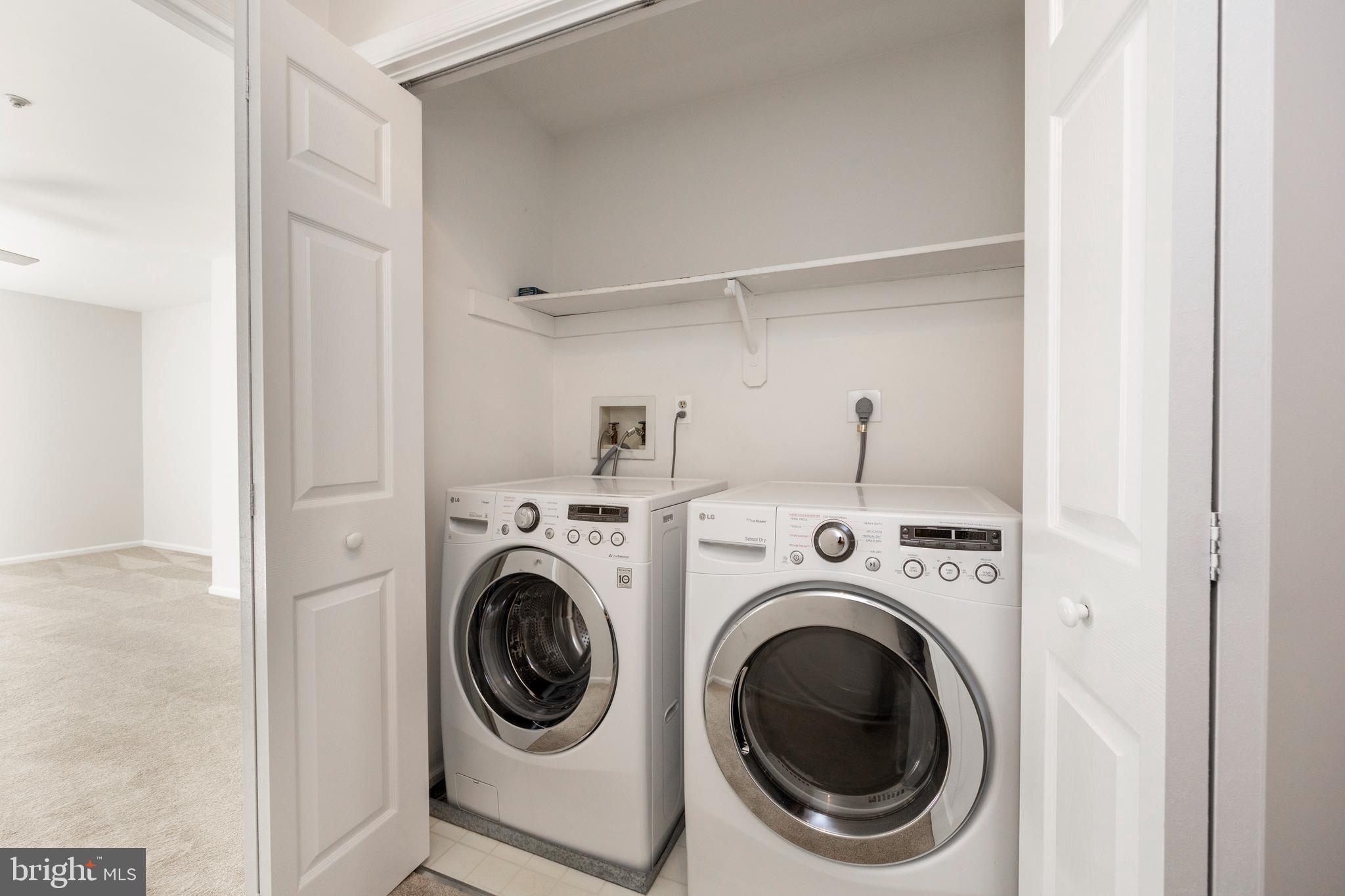 521 Pewter Drive Exton, PA 19341 - Photo 27 of 52 a utility room with dryer and washer