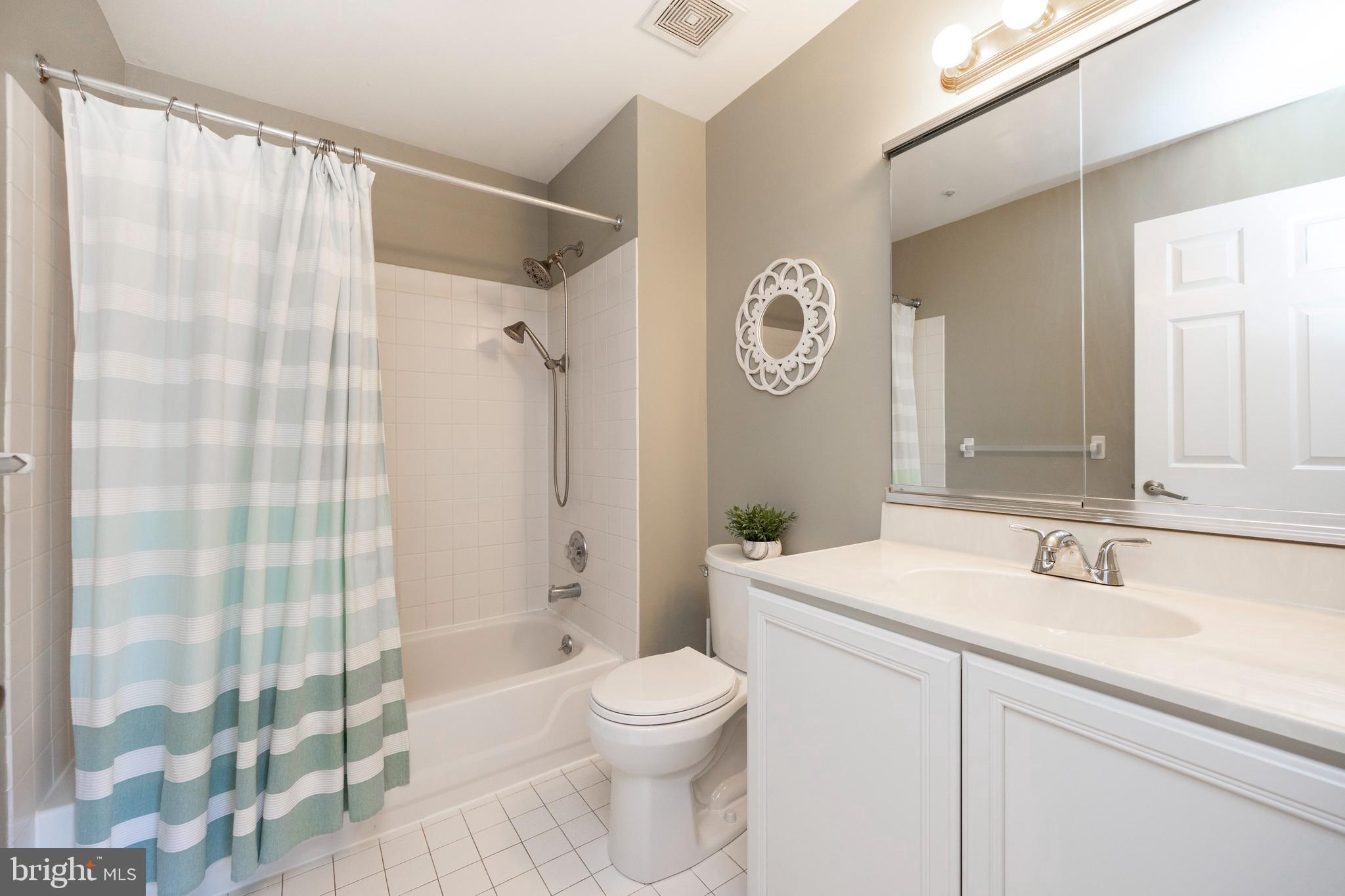 521 Pewter Drive Exton, PA 19341 - Photo 29 of 52 a bathroom with a sink a toilet and shower