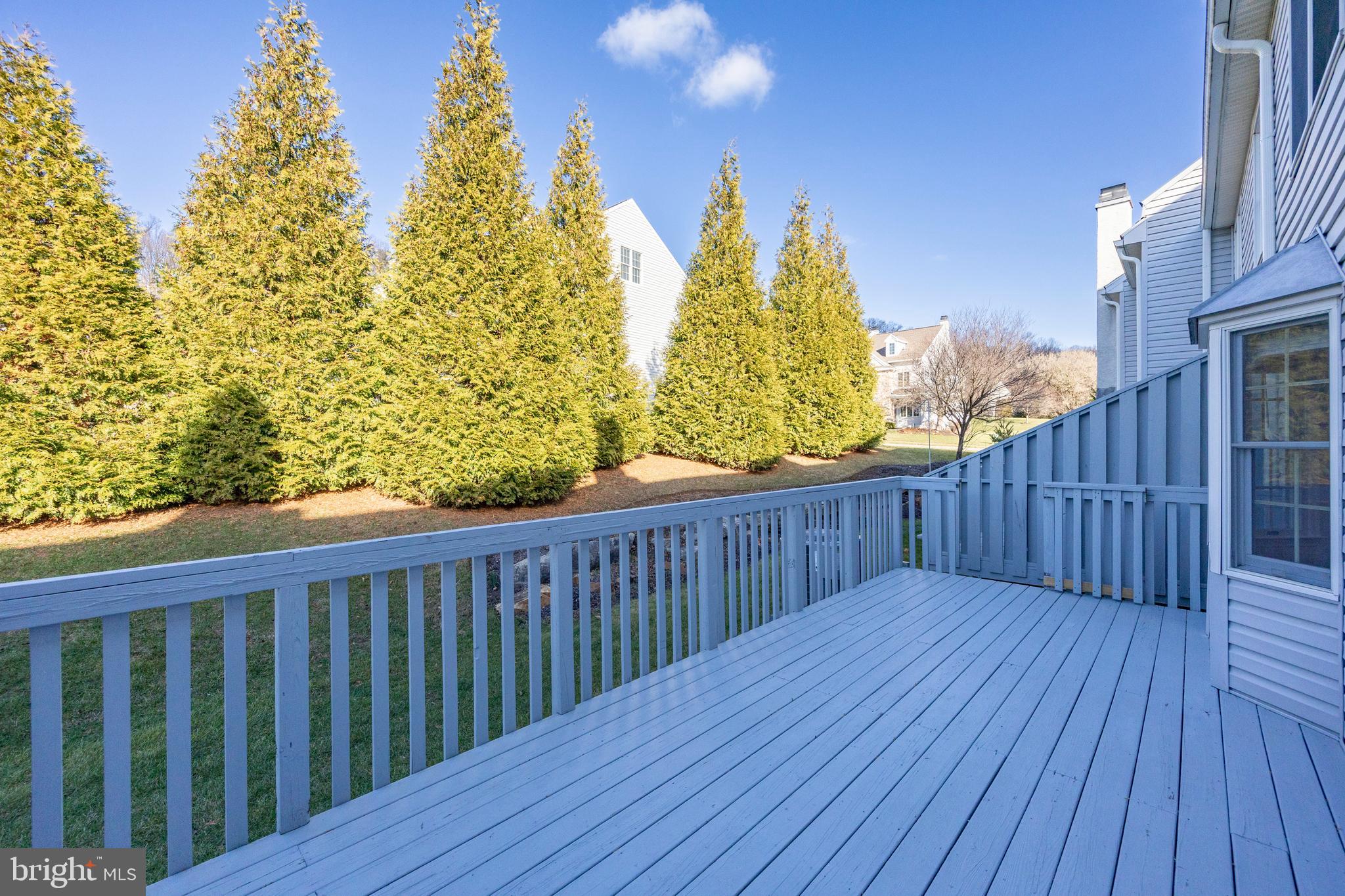 521 Pewter Drive Exton, PA 19341 - Photo 34 of 52 a balcony with wooden floor and fence