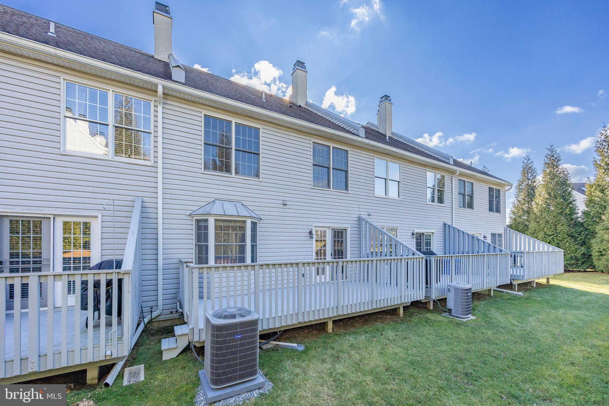 521 Pewter Drive Exton, PA 19341 - Photo 35 of 52 a view of a house with backyard and wooden fence