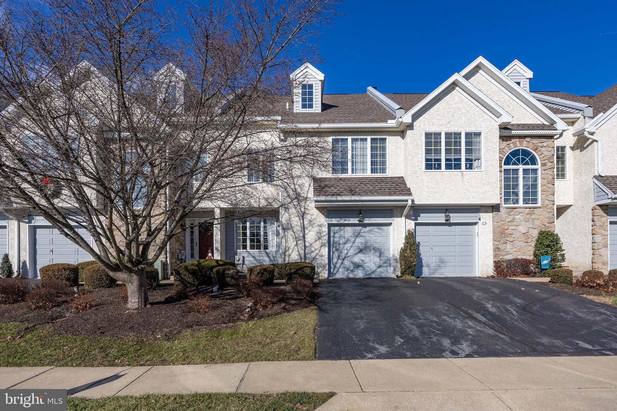 521 Pewter Drive Exton, PA 19341 - Photo 4 of 52 a front view of a house with a yard