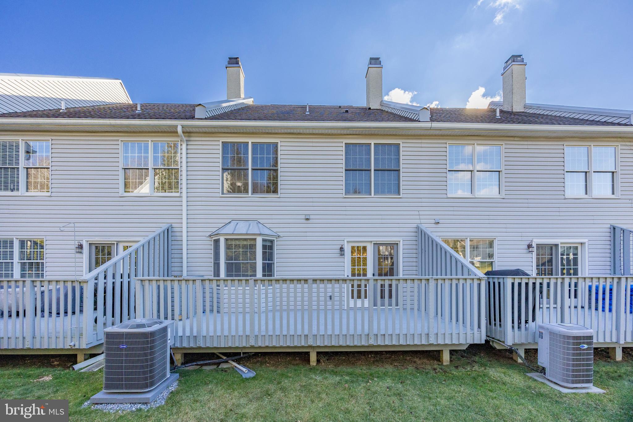 521 Pewter Drive Exton, PA 19341 - Photo 5 of 52 a front view of a house with garden and deck