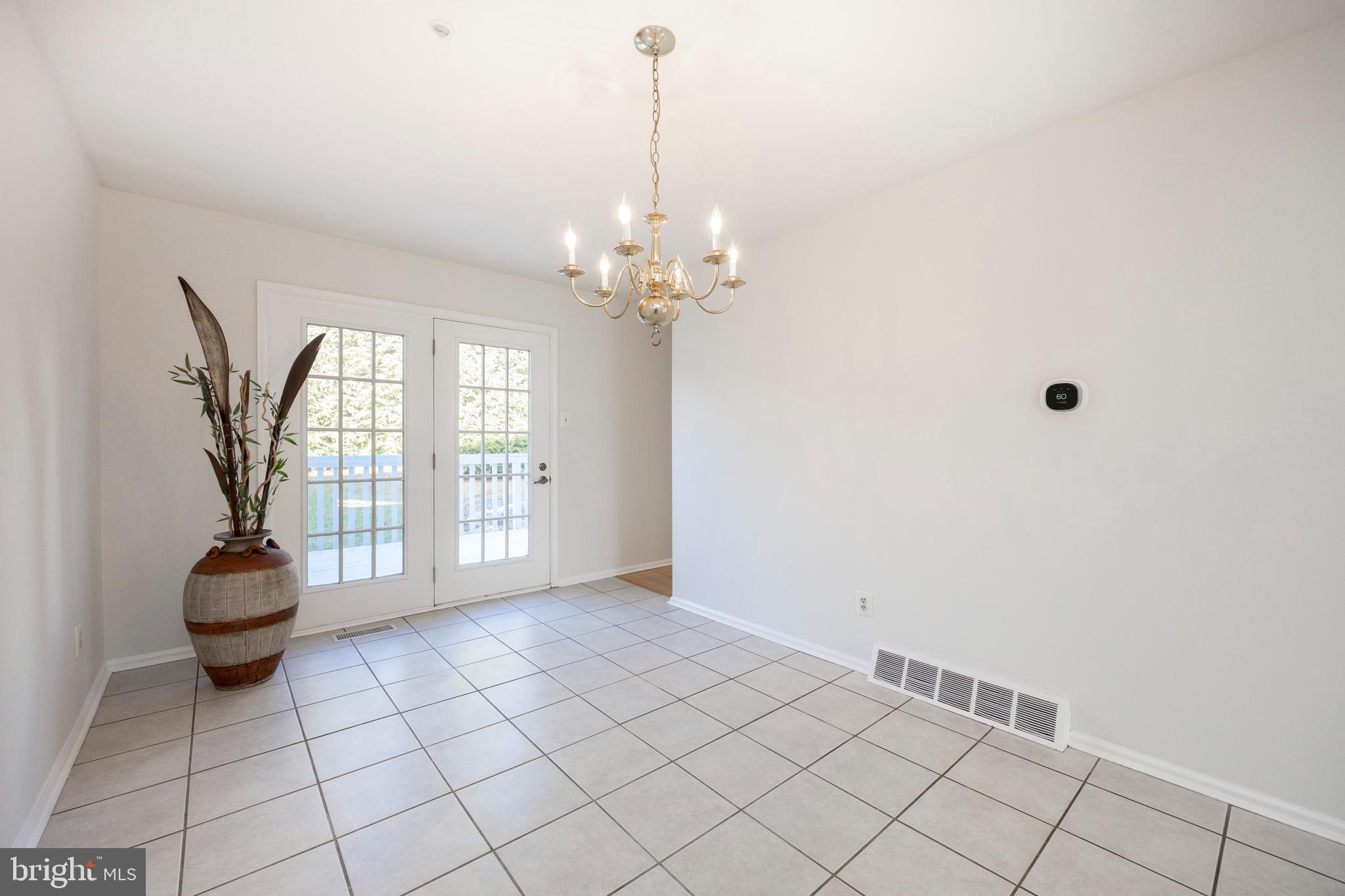 521 Pewter Drive Exton, PA 19341 - Photo 9 of 52 a view of an empty room with a window