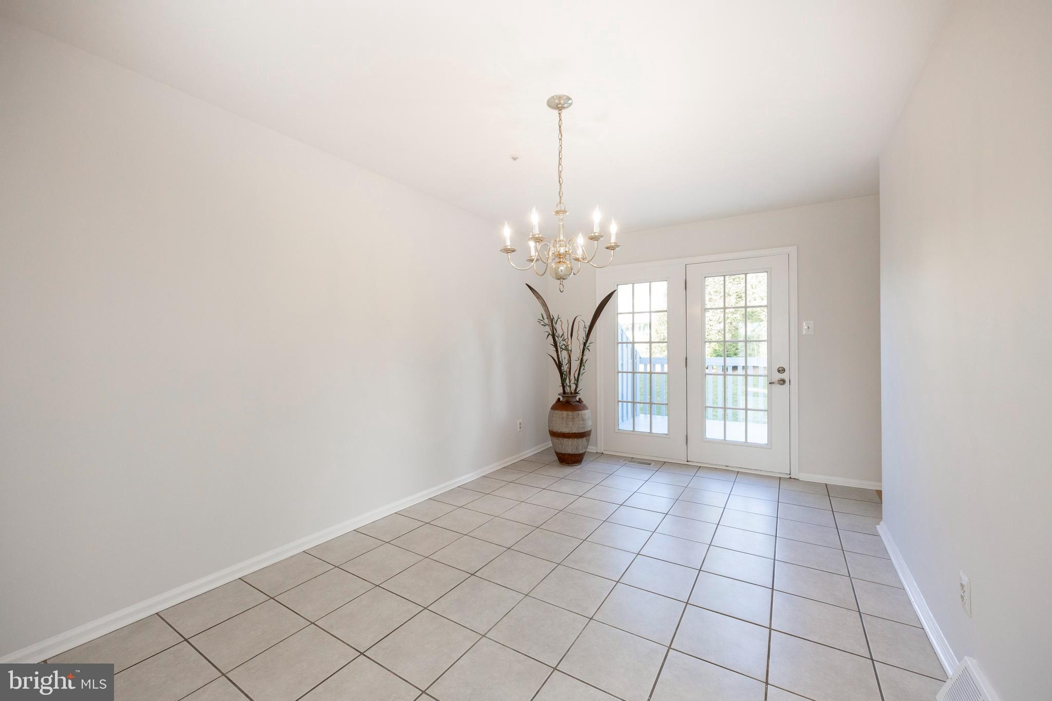 521 Pewter Drive Exton, PA 19341 - Photo 10 of 52 a view of an empty room with a window