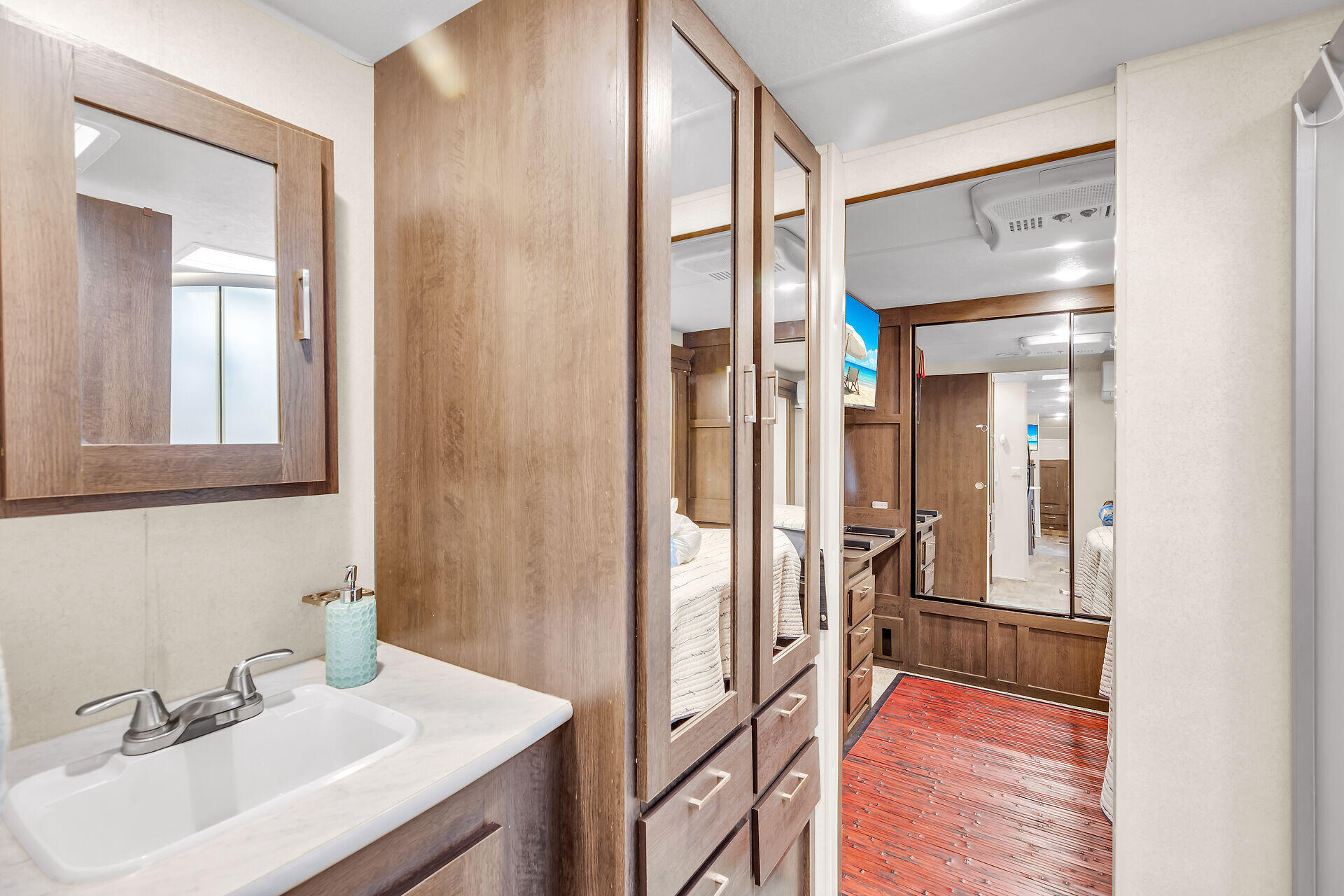 325 Calusa Street, Unit 70 Key Largo, FL 33037 - Photo 15 of 32 a bathroom with a sink and a mirror