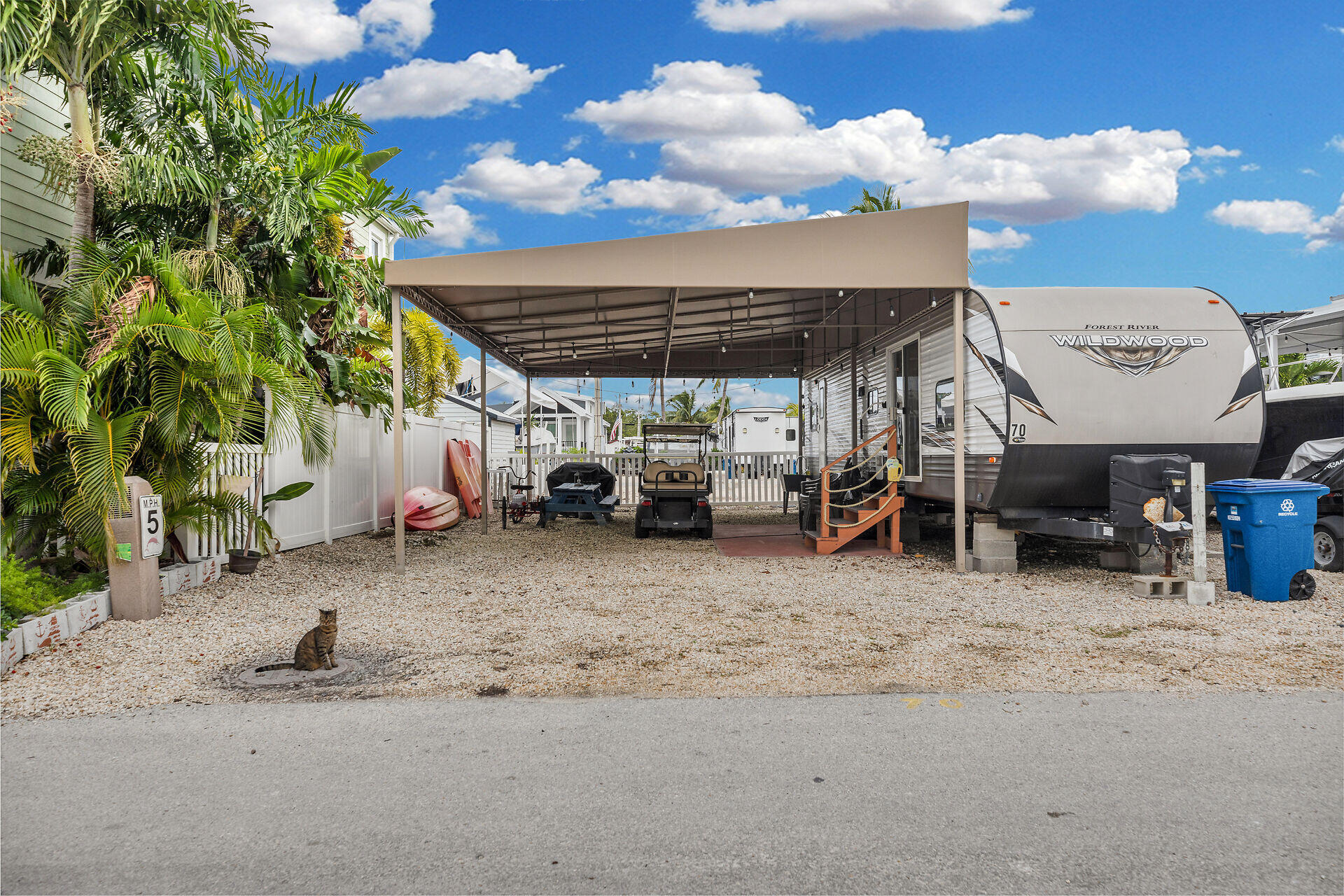 325 Calusa Street, Unit 70 Key Largo, FL 33037 - Photo 2 of 32 a view of a parking area
