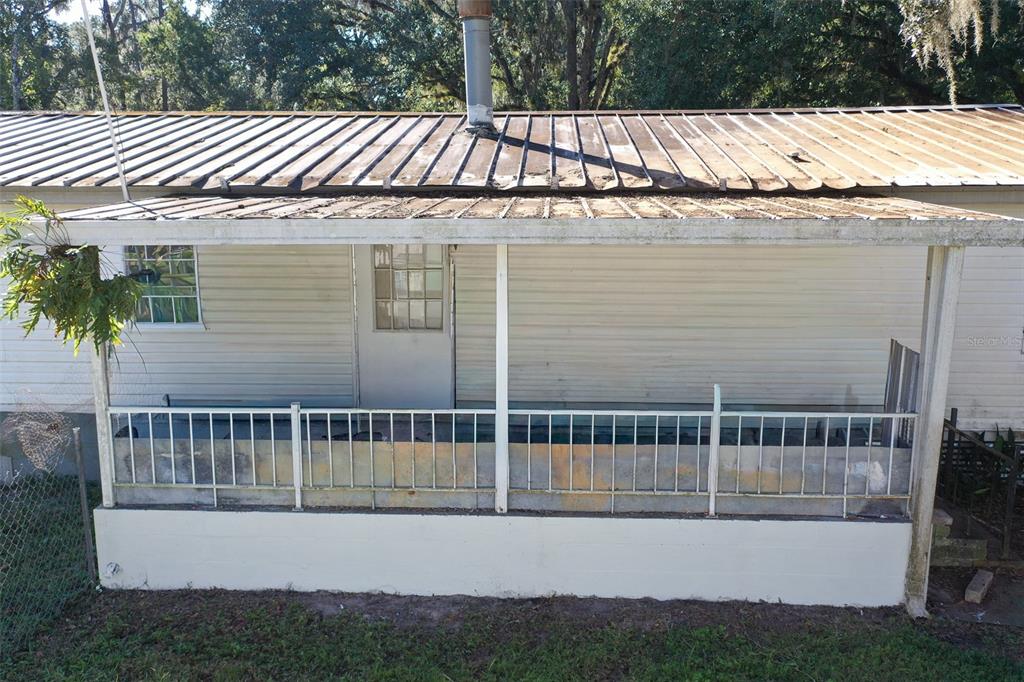 5013 Greenbriar Road Lakeland, FL 33810 - Photo 12 of 34 a view of balcony with a garden and stairs