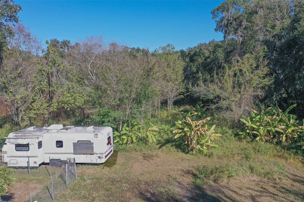 5013 Greenbriar Road Lakeland, FL 33810 - Photo 16 of 34 a view of a house with a yard