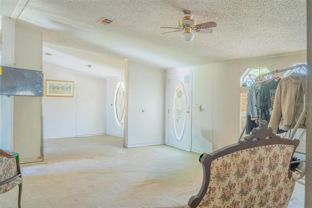 5013 Greenbriar Road Lakeland, FL 33810 - Photo 29 of 34 a view of empty room with a ceiling fan