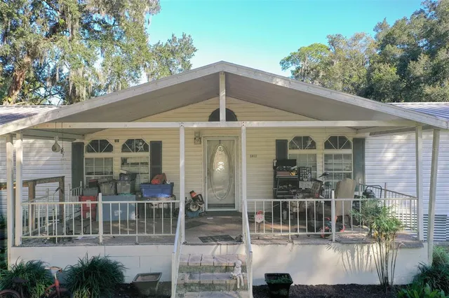 a front view of a house with porch