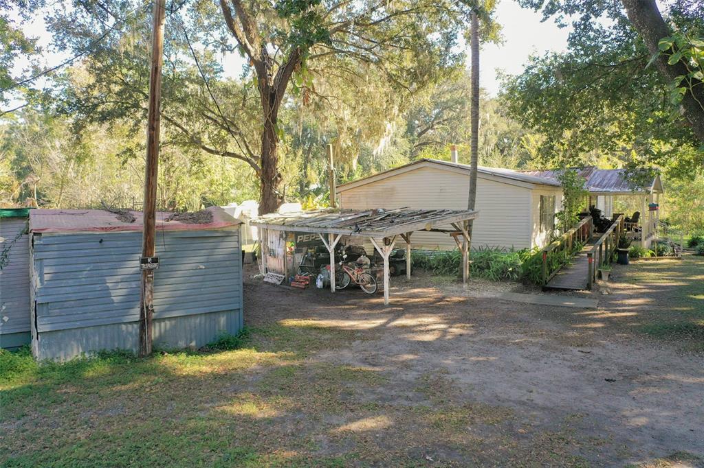 5013 Greenbriar Road Lakeland, FL 33810 - Photo 7 of 34 a view of a outdoor space with a house