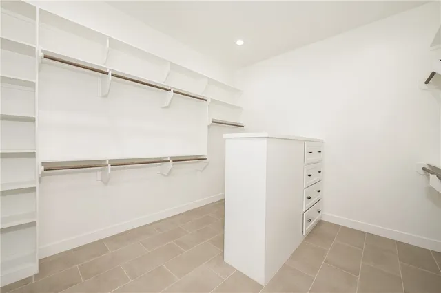 a view of an empty walk in closet