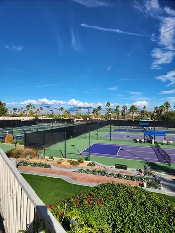 a view of a swimming pool with outdoor space