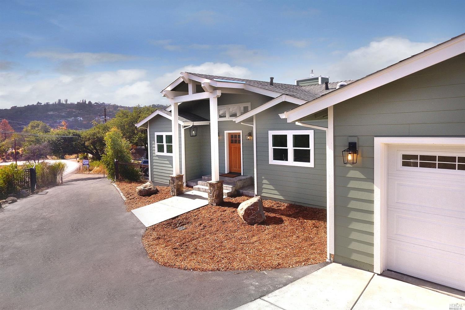 1287 Mark West Springs Road Santa Rosa, CA 95404 - Photo 1 of 1 a front view of a house with a yard