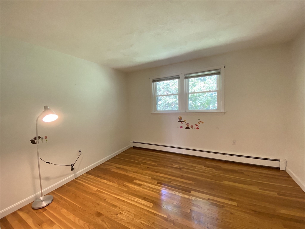 13 Oxbow Road Natick, MA 01760 - Photo 12 of 21 a view of an empty room and window