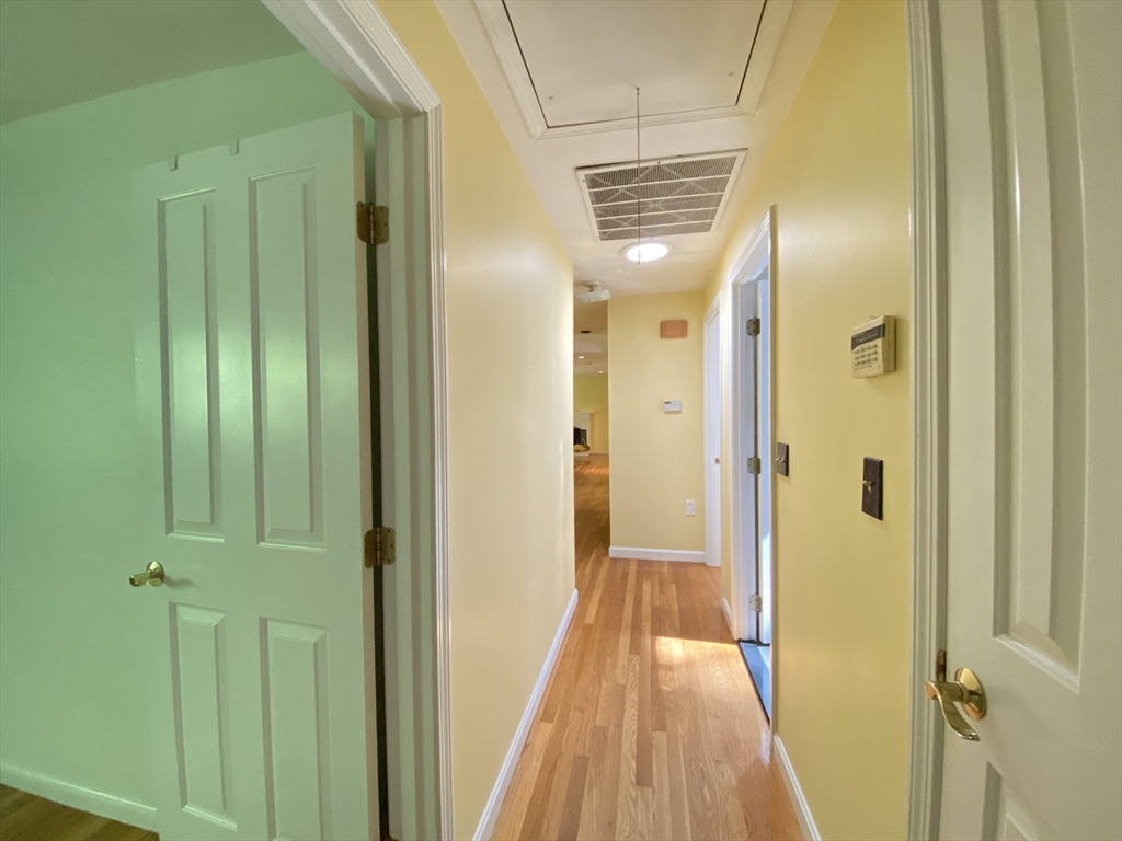 13 Oxbow Road Natick, MA 01760 - Photo 17 of 21 a view of a bathroom from the hallway