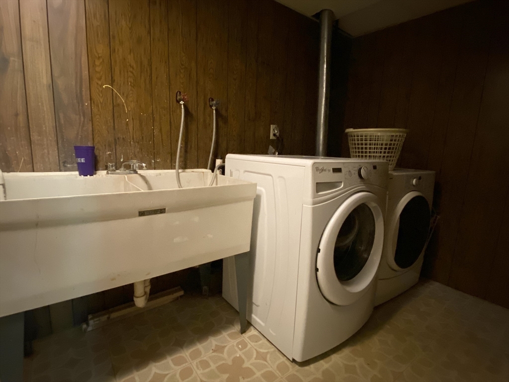 13 Oxbow Road Natick, MA 01760 - Photo 19 of 21 a room with a washing machine and a sink
