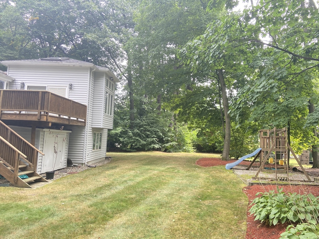 13 Oxbow Road Natick, MA 01760 - Photo 21 of 21 a view of a house with backyard and tree